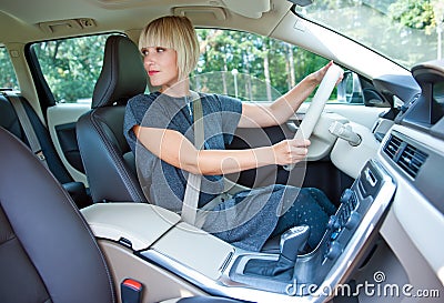 Woman driver parking her car Stock Photo