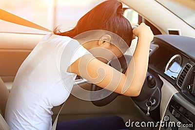 Woman driver sad in car Stock Photo