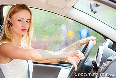 Woman driving car annoyed by heavy traffic Stock Photo