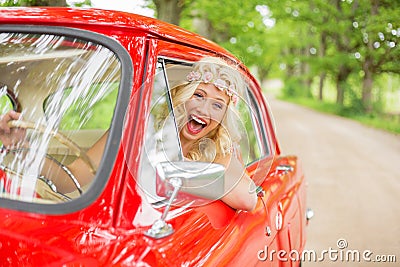 Woman driving a retro car Stock Photo