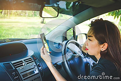 Woman driving astray Stock Photo