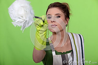 Woman dusting Stock Photo