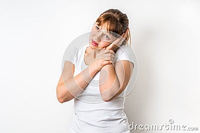 Woman with earache is holding her aching ear Stock Photo
