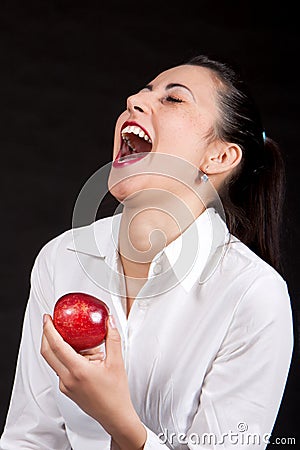 Woman eat red apple Stock Photo