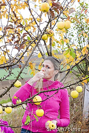 Woman eating an apple Stock Photo