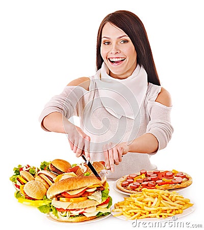 Woman eating fast food. Stock Photo