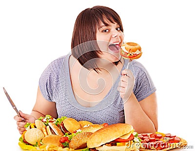 Woman eating fast food. Stock Photo