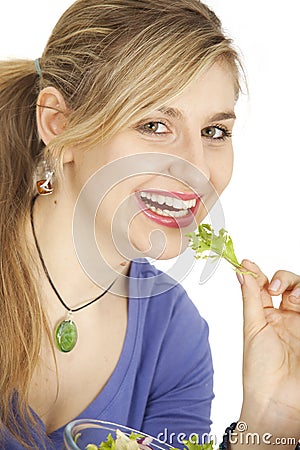 Woman eating salad Stock Photo