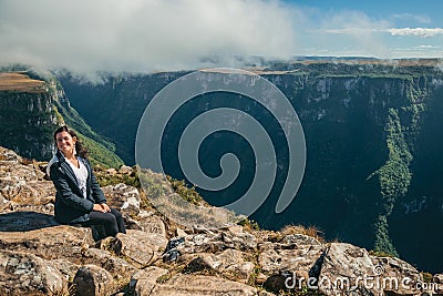 Woman on the edge of cliff at Fortaleza Canyon Editorial Stock Photo