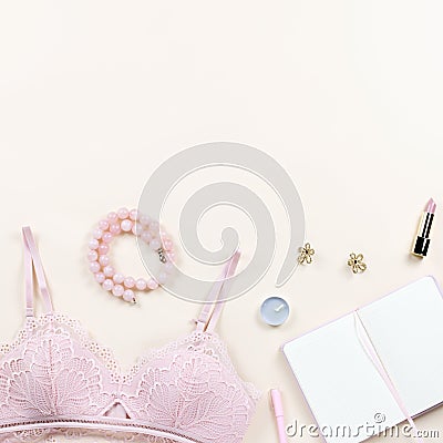 Woman elegant pink lace bra and panties, pumps and jewelry. Stylish lingerie flat lay. Stock Photo