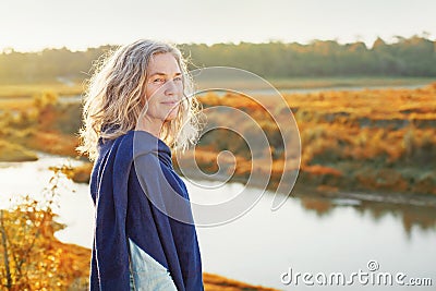 Woman enjoing river view Stock Photo