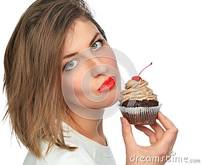 Woman enjoy chocolate cup cake dessert with cherry Stock Photo