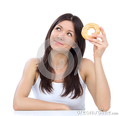 Woman enjoy sweet donut junk food weight loss concept Stock Photo
