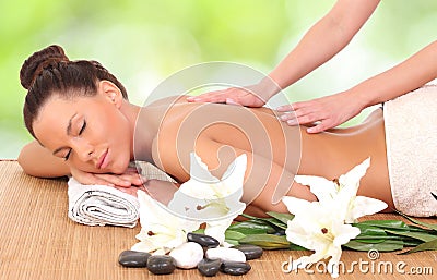 woman enjoying a massage therapy Stock Photo