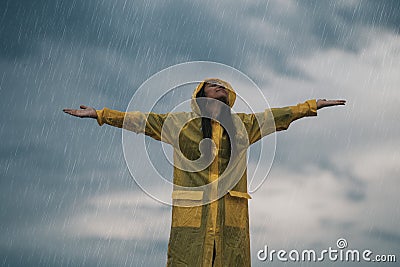 Woman enjoying rainy grey autumn day outdoors. soft daylight Stock Photo