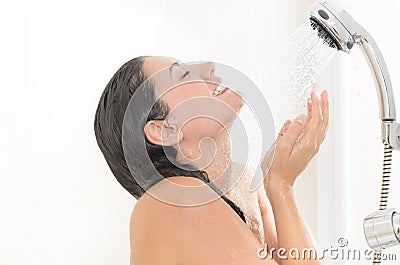 Woman enjoying a shower Stock Photo