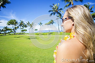 Woman enjoying a sunny Hawaiian vacation Stock Photo