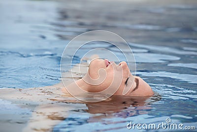 Woman enjoying water Stock Photo