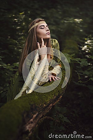 Woman enjoys forest beauty Stock Photo