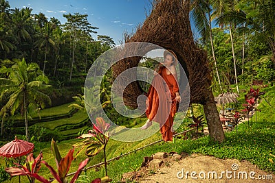 Woman enyoing wiew of Tegalalang Rice Terrace, Bali Stock Photo