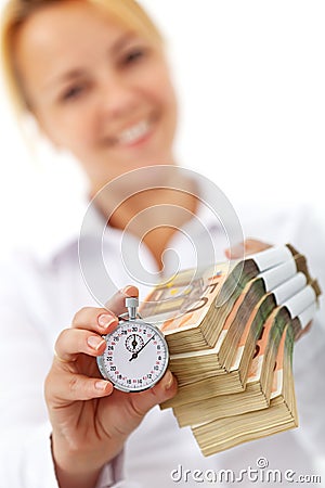 Woman with euro stacks and stopwatch Stock Photo