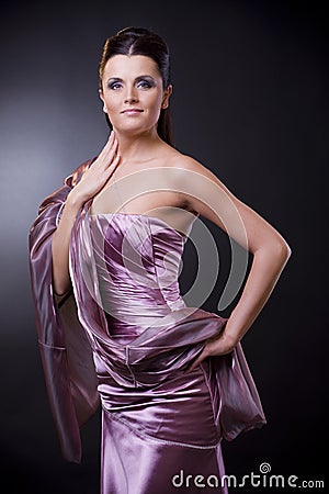 Woman in evening dress with stole Stock Photo