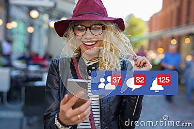 Woman excited about getting attention on social media Stock Photo