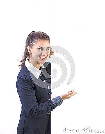 Woman excited pointing on empty blank billboard paper sign board. Young business woman isolated on white background Stock Photo