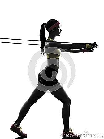 Woman exercising fitness workout resistance bands silhouette Stock Photo