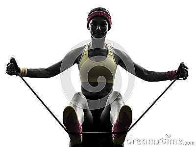 Woman exercising fitness workout resistance bands silhouette Stock Photo