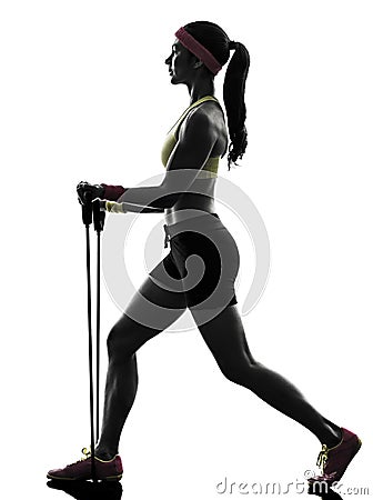 Woman exercising fitness workout resistance bands silhouette Stock Photo