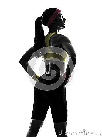 Woman exercising fitness workout standing silhouette rear view Stock Photo