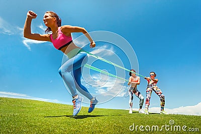 Woman exercising resistance rubber band Stock Photo