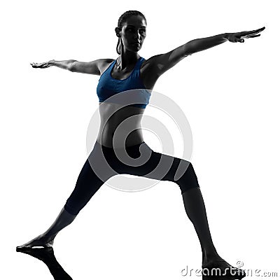 Woman exercising yoga warrior position 2 Stock Photo