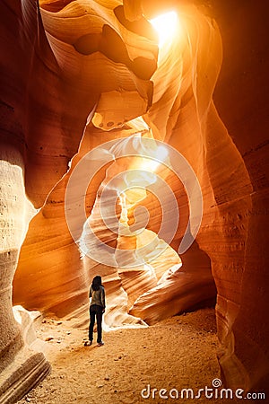 Woman exploring Lower Antelope Canyon Editorial Stock Photo