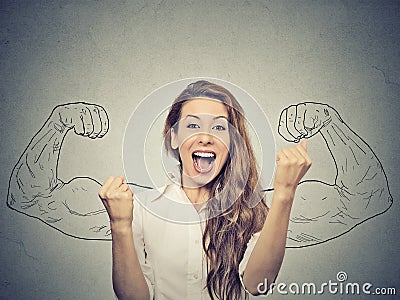 Woman exults pumping fists ecstatic celebrates success Stock Photo