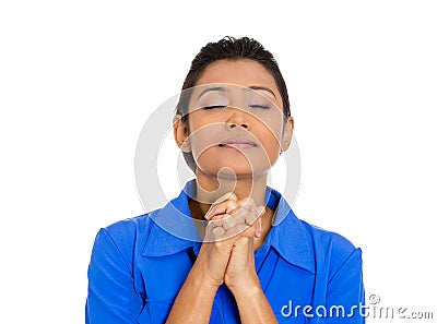Woman eyes closed praying hoping for the best Stock Photo
