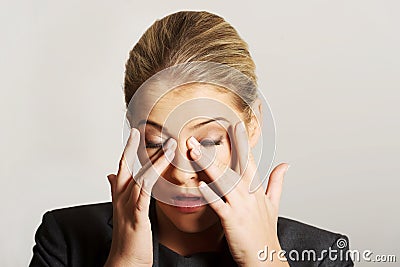 Woman with eyes pain Stock Photo