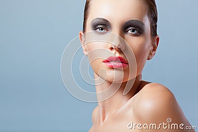 Woman face closeup portrait with smoky eyes Stock Photo