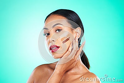 Woman, face and contour for skincare makeup or beauty cosmetics isolated against a studio background. Female smile with Stock Photo