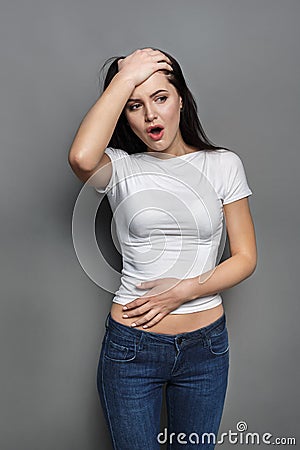 Woman face expressing shock or ache, surprise Stock Photo