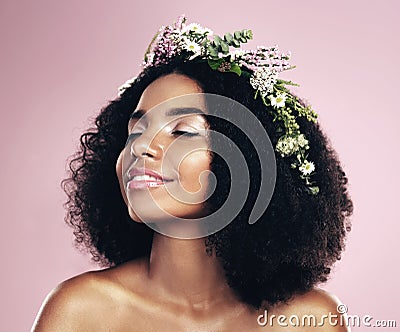 Woman, face and flower crown for beauty in studio, pink background and natural glowing skincare. African, female model Stock Photo