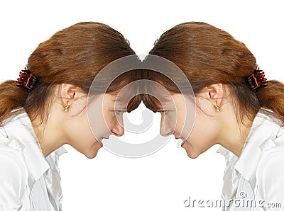 Woman facing her forehead with herself Stock Photo