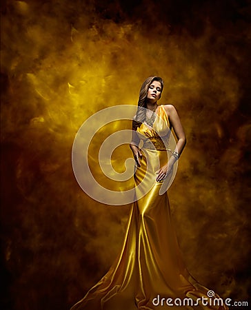 Woman Fashion Model Gold Dress, Beauty Girl in Glamour Gown Stock Photo