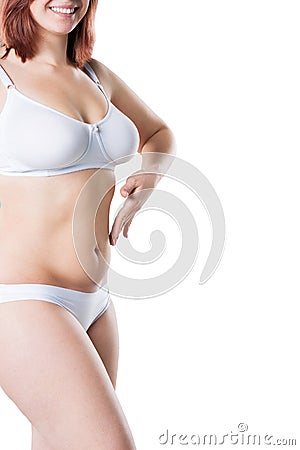 Woman with fat flabby belly, overweight female body isolated on white background Stock Photo