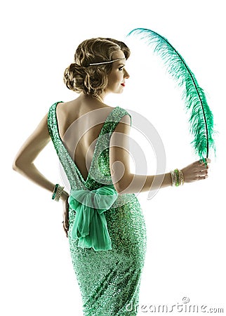 Woman feather in fashion retro sequin dress, elegant evening gown Stock Photo