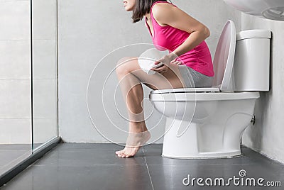 Woman feel pain with constipation Stock Photo