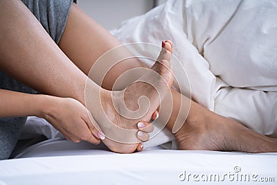 Woman Feeling Achilles Heel Pain Stock Photo