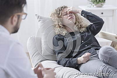 Woman feeling dizzy Stock Photo