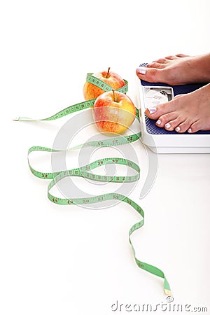 Woman feet weight scale isolated white background Stock Photo